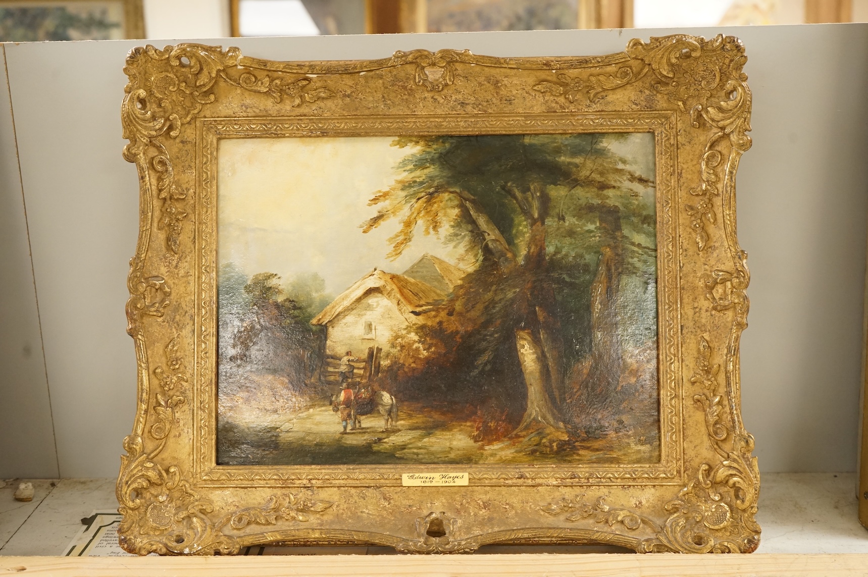 Edwin Hayes (1819-1904), Pastoral landscape with figure and horse before a cottage, signed, indistinctly dated 1844?, 22 x 29cm, applied plaque to the ornate gilt frame, oil on board